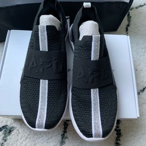 APL women’s techloom bliss, size 6.5. Black/silver/racer